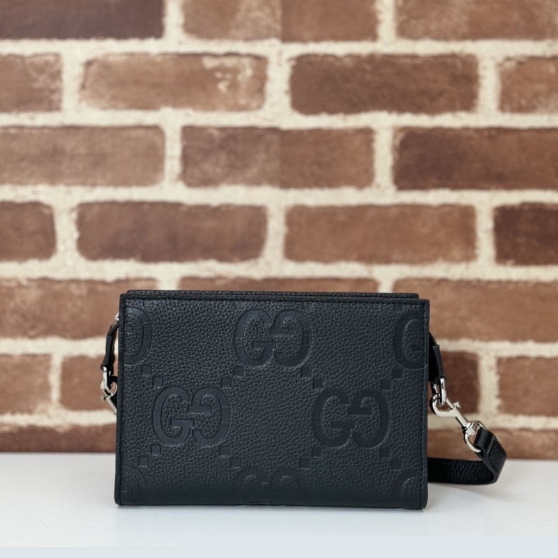 G*u*i clutch bags